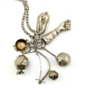 Vintage Brazilian silver-tone Penca de Balangandãs necklace with six dimensional charms and protective figa hand
