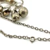 Vintage Brazilian silver-tone Penca de Balangandãs necklace with six dimensional charms and protective figa hand