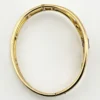 Circa 1950s gold-filled openwork clamper bracelet with rectangular amethyst glass stone and scroll decoration
