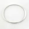 Oval interior of Taxco sterling silver bangle with a 7 3/4-inch circumference