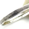 Vintage Beau sterling silver wide bangle with mirrored arch and diamond geometric pattern