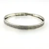 Round mid-century Beau Sterling bangle bracelet with a 7 3/4-inch interior circumference