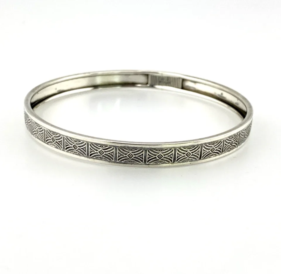 Round mid-century Beau Sterling bangle bracelet with a 7 3/4-inch interior circumference