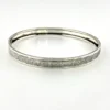 Round mid-century Beau Sterling bangle bracelet with a 7 3/4-inch interior circumference