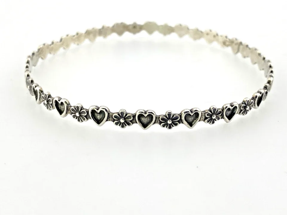 Mid-century Beau Sterling hearts-and-flowers bangle with an 8-inch circumference