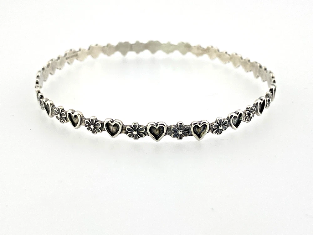 Mid-century Beau Sterling hearts-and-flowers bangle with an 8-inch circumference