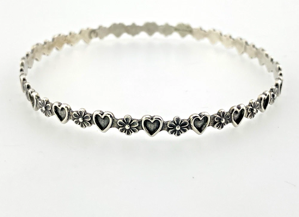 Mid-century Beau Sterling hearts-and-flowers bangle with an 8-inch circumference