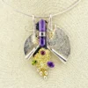 Late-1980s Modernist sterling silver and gold-vermeil Art-to-Wear pendant necklace with amethyst, garnet and peridot
