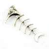 Vintage sterling silver fish skeleton pendant with cast head and articulated fabricated body