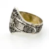 Chinese export silver buckle bracelet with pierced bamboo, flowers, figures and raised Chinese characters