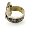 Chinese export silver buckle bracelet with pierced bamboo, flowers, figures and raised Chinese characters