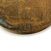1909 Hudson-Fulton bronze medal showing Robert Fulton’s portrait above three seated allegorical women and a model steamboat.
