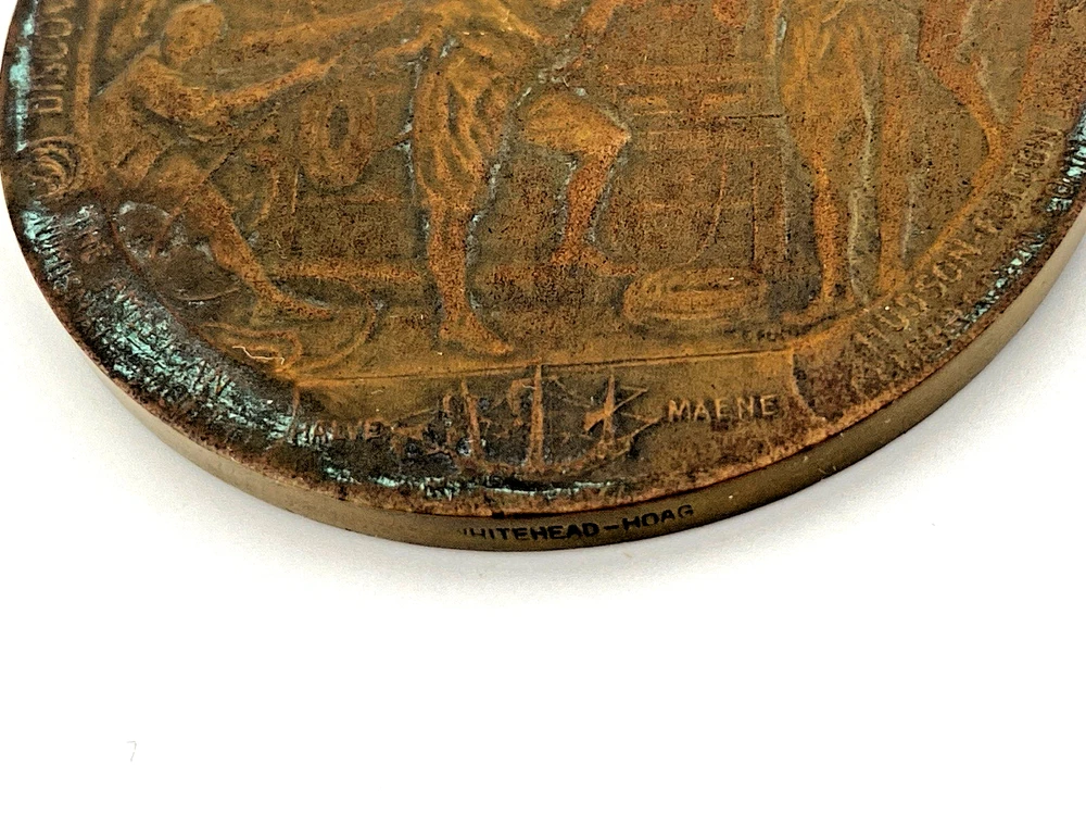 1909 Hudson-Fulton bronze medal showing Robert Fulton’s portrait above three seated allegorical women and a model steamboat.