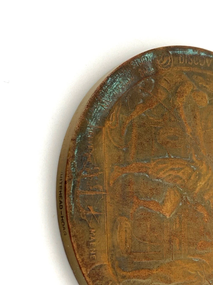 1909 Hudson-Fulton bronze medal showing Robert Fulton’s portrait above three seated allegorical women and a model steamboat.