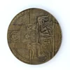 1909 Hudson-Fulton bronze medal showing Robert Fulton’s portrait above three seated allegorical women and a model steamboat.