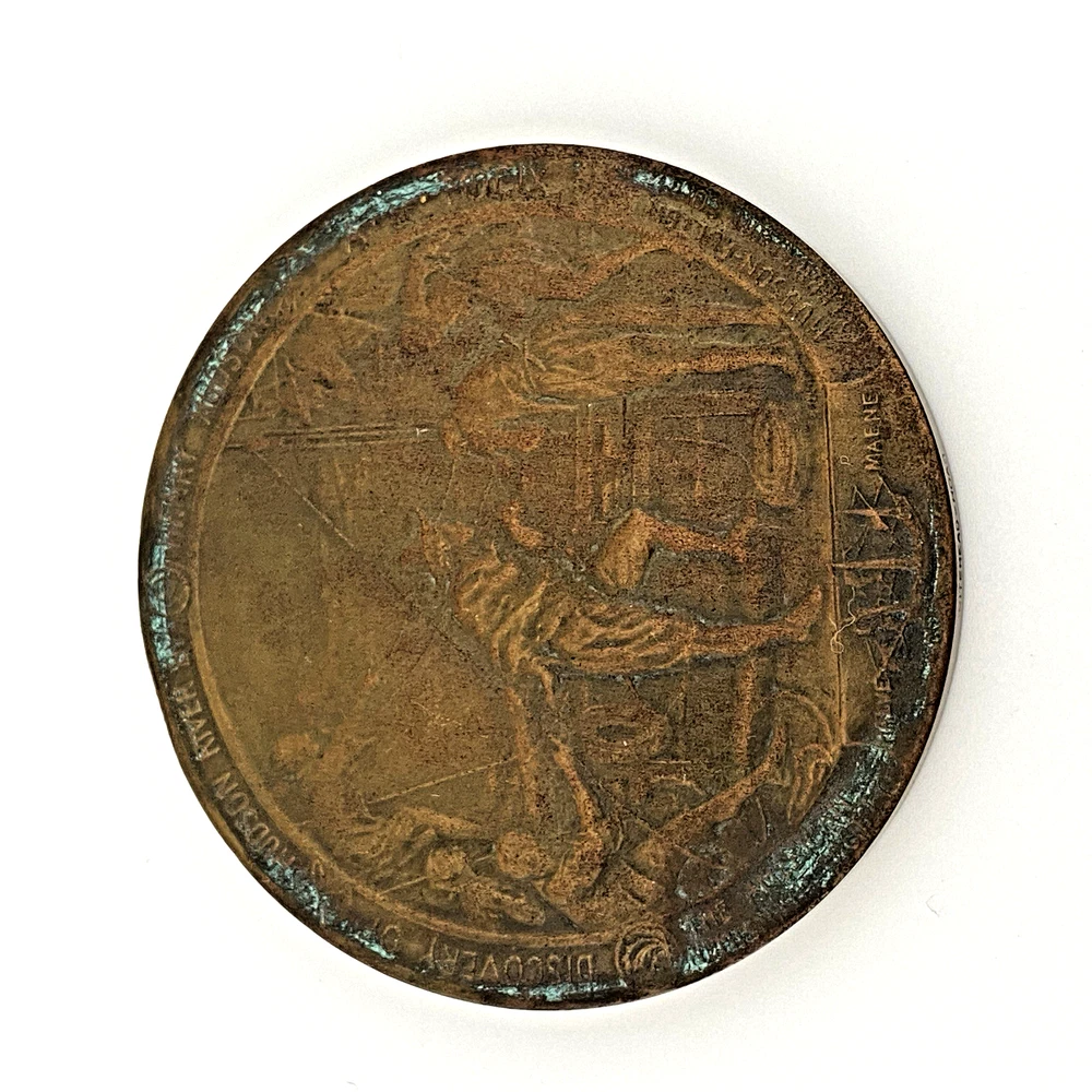 1909 Hudson-Fulton bronze medal showing Robert Fulton’s portrait above three seated allegorical women and a model steamboat.