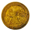 1934 United Lutheran Church bronze medal showing a religious figure facing an emigrant family beneath an angel, with Savannah convention inscriptions.