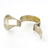 Chinese export silver buckle bracelet with pierced bamboo, flowers, figures and raised Chinese characters