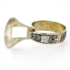 Chinese export silver buckle bracelet with pierced bamboo, flowers, figures and raised Chinese characters