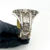 Chinese export silver buckle bracelet with pierced bamboo, flowers, figures and raised Chinese characters