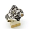 Chinese export silver buckle bracelet with pierced bamboo, flowers, figures and raised Chinese characters