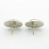 Great Falls Metal Works oval light blue mabé pearl earrings in narrow sterling silver bezels, shown upright from the front.