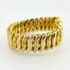 Pitman & Keeler American Queen gold filled expansion bracelet with alternating polished and patterned links and a pinstriped, engraved heart centerpiece.