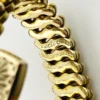 Pitman & Keeler American Queen gold filled expansion bracelet with alternating polished and patterned links and a pinstriped, engraved heart centerpiece.