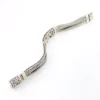 Multistrand silver bracelet with square woven chains, curved scrollwork panel, oval garnet and decorated box clasp
