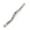 Multistrand silver bracelet with square woven chains, curved scrollwork panel, oval garnet and decorated box clasp