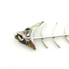 Vintage sterling silver fish skeleton pendant with cast head and articulated fabricated body