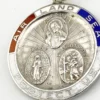 Vintage sterling silver Catholic protection medal with red, white and blue enamel and devotional imagery on both sides.