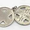 Chapel sterling silver four-way swivel medal with patriotic enamel, devotional figures and a personal inscription dated 1967.