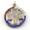 Chapel sterling silver four-way swivel medal with patriotic enamel, devotional figures and a personal inscription dated 1967.