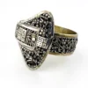 Chinese export silver buckle bracelet with pierced bamboo, flowers, figures and raised Chinese characters
